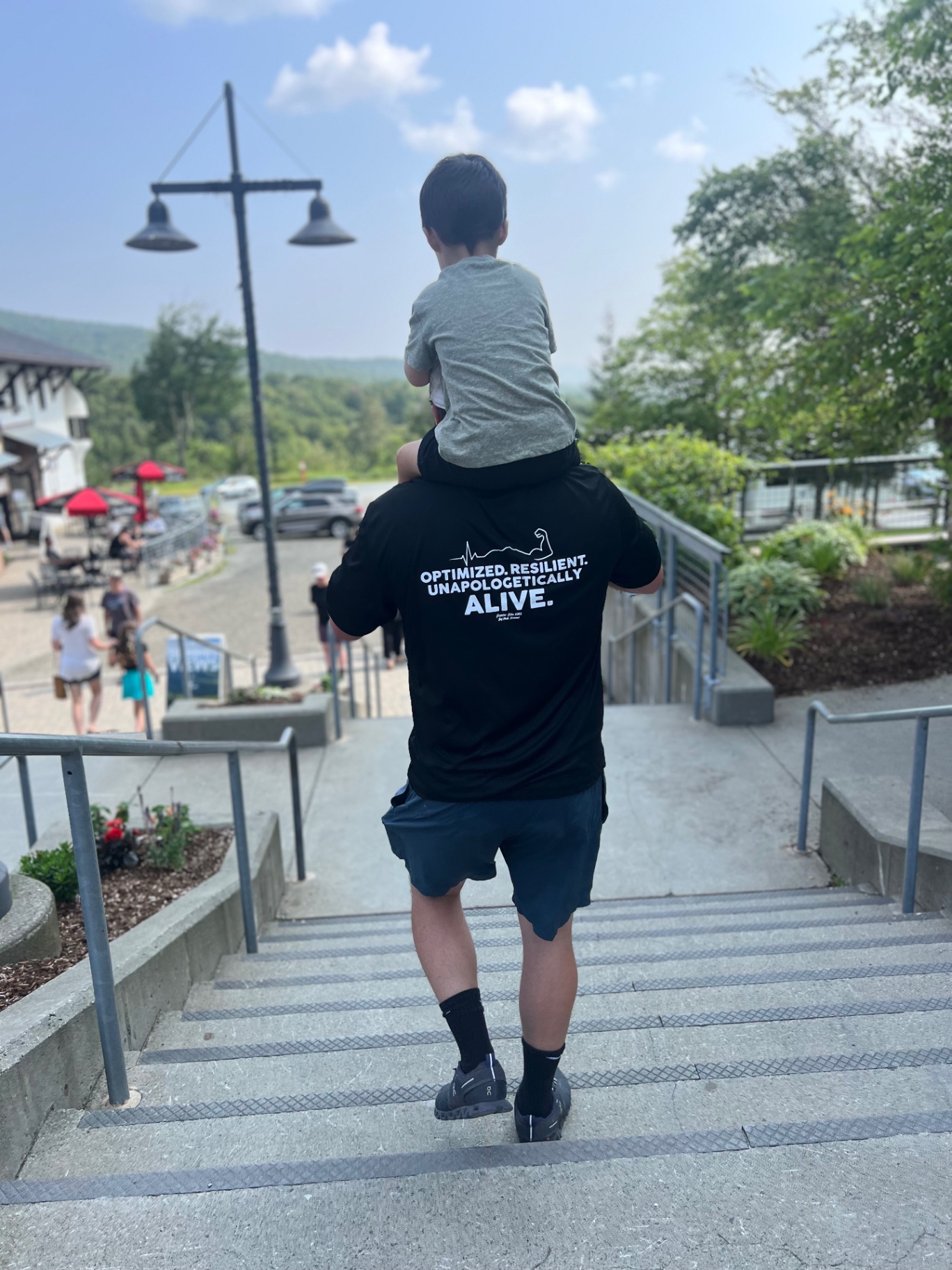 Father and son heading down from the summit lodge