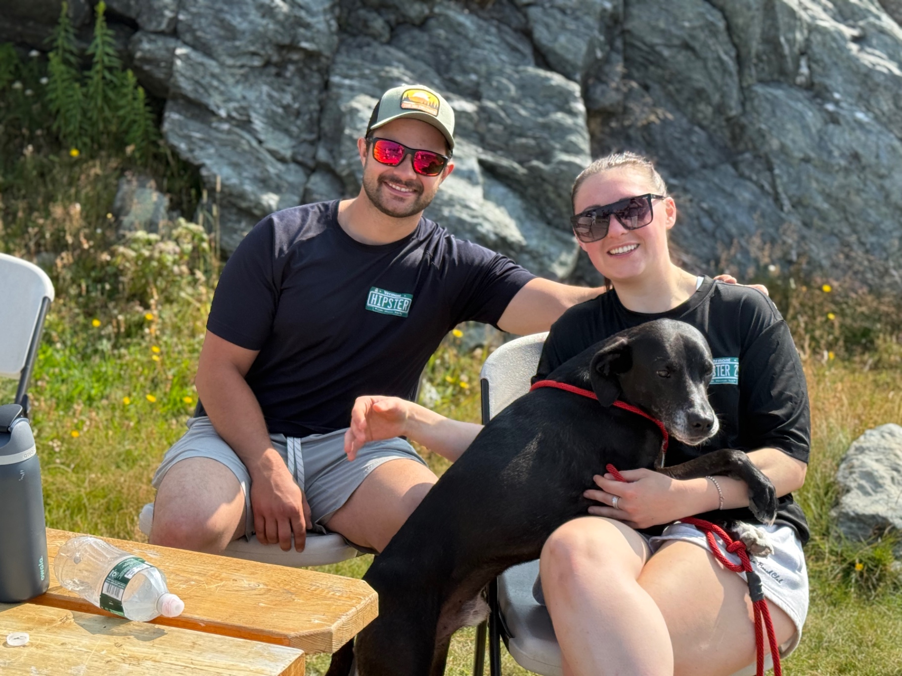 Couple and their pup at the summit lunch spot